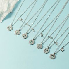 Style: Korean Style/Korean Style Fashion Element: Letters Silver Initial Pendant Clavicle Chain Necklace, Silver Initial Necklace With Round Shape, Silver Round Initial Clavicle Necklace, Silver Initial Necklace With Clavicle Chain And Round Pendant, Personalized Round Alloy Necklace, Silver Initial Necklace With Adjustable Chain, Trendy Necklaces, Chain Necklaces, Style Korean