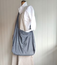 A really lovely, large made in quality cotton chambray. As it is inspired by a traditional messenger bag, it can be comfortably worn across the body for every day use. We have also made it with handles for the times when you want to hold it like a tote. Very handy indeed. Each bag has it's own unique lining! Fully lined in cotton shirt fabrics, with two internal pockets. The shirts used to line our bags are from quality shirt makers of Jermyn Street, London. Our fabrics are of the highest quality, making it a very strong, versatile bag for any season. It is a really great bag for everyday use....spacious enough to carry books, laptops, etc.... Becomes a lifesaver when you forget to take an extra bag for shopping, as it makes a great shopper too! Also, makes a great baby changing bag! A tru Versatile Cotton Shoulder Bag With Adjustable Strap, Versatile Cotton Canvas Bag With Adjustable Strap, Cotton Hobo Bag With Pockets, Versatile Cotton Hobo Bag For Everyday Use, Versatile Cotton Canvas Shoulder Bag, Versatile Everyday Cotton Hobo Bag, Everyday Cotton Crossbody Canvas Bag, Everyday Cotton Shoulder Bag With Adjustable Strap, Cotton Shoulder Bag With Adjustable Strap For On-the-go