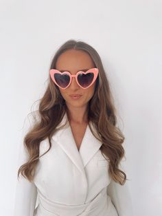 We are obsessed with these heart sunglasses! They are the perfect accessory for your hen do whether your're on holiday with your bridal party or on a sunny staycation.  Perfect for the bride, her bridesmaids and her bridal party! Bridesmaid Heart Sunglasses, Bridal Heart Sunglasses, Heart-shaped Party Sunglasses With Heart Print, Pink Heart Sunglasses, Bride Sunglasses, Playful Pink Heart-shaped Sunglasses, Heart Glasses, Heart Shaped Sunglasses, Heart Sunglasses