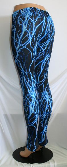 LIGHTNING BOLT / STORM LEGGINGS Awesome Fabric - Glows Under Blacklight!! 5 Dazzling Colors!! Matching Top Available Also! CUSTOM REQUESTS: All items can be adjusted to your needs!! → Waist higher/lower, inseam longer/shorter, different fabric, style or color → If you need help with sizing, send me a message with your measurements: Bust / Waist / Hips / Girth → We custom make many different styles in all sizes!! * Toddler, Child, Women, Men, Plus Size * Shorts, Tops, Leggings, Skirts, Leotards, Blue Stretch Rave Bottoms, Thigh High Fitted Leggings For Cosplay, Black Stretch Leggings For Cosplay, Fitted Thigh-high Cosplay Leggings, Fitted Thigh High Leggings For Cosplay, Lightning Leggings, Storm Lightning, Glow Party, Men Plus Size