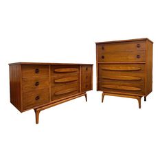 two wooden dressers with drawers on each side and one drawer is missing the top