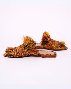 Multicolor Slip-on Mules For Beach, Multicolor Slip-on Beach Mules, Bohemian Woven Leather Sandals For Beach, Bohemian Woven Leather Beach Sandals, Orange Sandals With Woven Sole For The Beach, Orange Beach Sandals With Woven Sole, Brown Woven Sandals For Spring, Brown Woven Straw Sandals, Brown Bohemian Woven Sandals