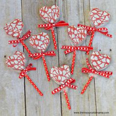 valentine's day treats are arranged in the shape of hearts and candy canes