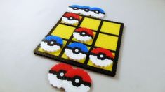 a close up of an object made out of lego blocks with pokemon characters on it