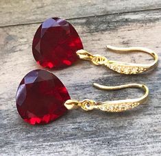 Burgundy Garnet gold pave earrings. Heart cut garnets. Red stone jewelry. Red garnet dangles. Dark r Red Pear-shaped Earrings For Gift, Red Dangle Jewelry With Gemstone Accents, Ruby Gemstone Earrings As Gift, Faceted Pear-shaped Earrings For Gift, Lab-created Ruby Gemstone Earrings As Gift, Lab-created Ruby Gemstone Earrings For Gift, Red Heart Cut Elegant Earrings, Elegant Red Heart Cut Earrings, Ruby Teardrop Jewelry For Valentine's Day