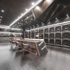 an empty room with many wine racks in the wall and wooden flooring on the walls