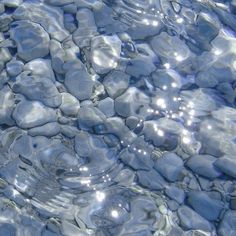 the water is crystal clear and has rocks in it's bottom layer, as well as bubbles