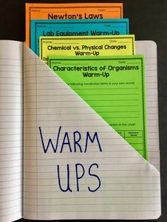 notebooks with the words warm ups written on them