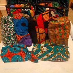 Beautiful and unique African print makeup / cosmetic bags with zip.  Keeps everything nice and organised. Great for travel or carrying toiletries items for overnight stays. Genuine African fabric. No 2 designs are the same, so your bag will always be one of a kind, and personal to you. Perfect size for storing your makeup, brushes, mascara, nail polish and/or toothpaste and toothbrush etc. Makes a beautiful gift for any occasion. SHIPPING Your item(s) will be shipped / posted within 1-2 business Multicolor Foldable Bag As Gift, Multicolor Foldable Bag For Gift, Multicolor Foldable Bags For Gift, Multicolor Portable Cosmetic Bag For Travel, Multicolor Portable Travel Cosmetic Bag, Portable Multicolor Travel Cosmetic Bag, Multicolor Travel Pouch Cosmetic Bag, Multicolor Travel Cosmetic Pouch, Portable Multicolor Rectangular Cosmetic Bag