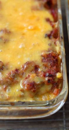 two casserole dishes filled with cheese and meat