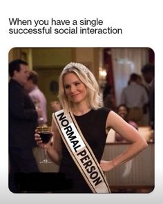 a woman in a black dress holding a wine glass with the caption when you have a single successful social interaction