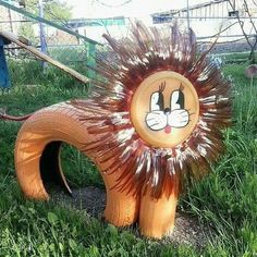 there is a lion statue in the grass