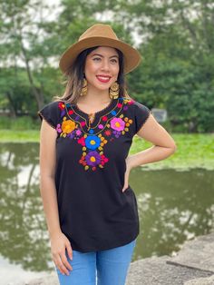 This Beautiful Floral Hand Embroidered Blouse is the perfect Top for Everyday use or a special event. This blouse is hand embroidered by Mexican Artisans and is completely one of a kind! This blouse comes in one size which fits sizes Small and Medium. More Colors Available here: https://www.etsy.com/es/listing/820969974/blusa-floral-bordado-a-mano-blusa-floral?ref=listing_published_alert Bohemian V-neck Embroidered Top, Bohemian Multicolor Embroidered V-neck Top, Bohemian V-neck Blouse With Multicolor Embroidery, Multicolor Embroidered Cotton V-neck Top, Bohemian Tops With Geometric Embroidery For Beach, Bohemian Embroidered Top With Embroidered Border For Festivals, Bohemian Embroidered Top With Geometric Design For Vacation, Bohemian Beach Tops With Geometric Embroidery, Bohemian Tops With Geometric Embroidery