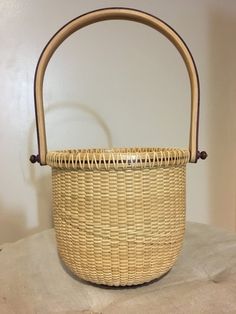 a wicker basket sitting on top of a table