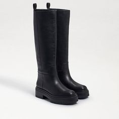 Sam Edelman Larina Waterproof Boot New In Box The Practical And Snug Sam Edelman Larina Waterproof Boot Puts A Contemporary Spin On A Knee-High Boot That's A Standout Addition To Any Look. The Waterproof Material Makes For The Most Protective Walk On Rainy Days, So Grab A Statement Umbrella To Complete The Look. Pull On Style. Classic Round Toe Silhouette. Pull Tab In Back For Easy On And Off Access. Leather Upper. Lining, Insole, And Outsole Made Of Man-Made Material. Imported. Product Measurem Prada Riding Boots, Black Waterproof Knee-high Boots, Black Boots With Rubber Sole For Rainy Weather, Black Knee-high Waterproof Boots, Black Weatherproof Boots For Work, Black Waterproof Boots For Winter Workwear, Waterproof Leather Boots For Rainy Weather, Winter Black Waterproof Boots For Workwear, Winter Black Waterproof Workwear Boots