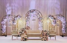 an elegant wedding setup with flowers and chairs