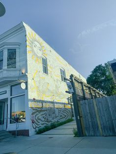 a building with a mural painted on it's side