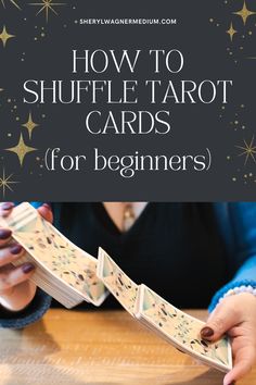 a woman is holding two tarot cards with the text how to shuffle tarot cards for beginners