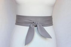 Taupe Leather Obi belt Petals style Women's belt leather soft genuine leather Cinch wrap beltMade of premium quality leather. 100% handmade.Unique and simple design. Quality craftsmanship.The material is soft and comfortable to wear. Pure  leather, with natural shadings and scars.*IMPORTANT SIZING TIP:When selecting the size you need, please select the size that fits your waist measurement and you will be able to tie a simple knot because the both ends will be 5" - 8" long.  If you want a rich b Chic Spring Belts With Sashes, Adjustable Belt For Formal Occasions In Spring, Adjustable Formal Belt For Spring, Elegant Adjustable Corset Belt For Spring, Elegant Adjustable Spring Corset Belt, Elegant Spring Adjustable Corset Belt, Spring Formal Adjustable Belt, Chic Fitted Sash Belt, Elegant Adjustable Leather Corset Belt