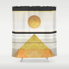 a shower curtain with an abstract design on the front and back sides, in gold