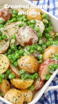 a white bowl filled with potatoes and peas