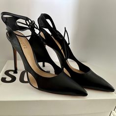 Size 8.5 Sharon Cutout Leather Ankle-Tie Pumps In Black Leather. Also Has Side Cutouts To The Stiletto Pump Topped With A Slim Ankle Strap. Heel Is About 4'' - 5 '' Inches. Brand New ! Never Been Worn ! Comes With Original Box And Original Schutz Dust Bag. Leather Ankle Tie Heels For Evening, Ankle Tie Leather Heels For Evening, Evening Ankle Tie Leather Heels, Black Leather Ankle Tie Heels, Chic Ankle Tie Heels For Night Out, Black Ankle Tie Heels For Formal Occasions, Leather Heels With Ankle Tie And Heel Strap, Leather Heels With Heel Strap And Ankle Tie, Formal Leather Heels With Ankle Tie