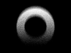 a black and white photo of a circular object in the dark sky with no clouds