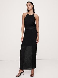 This maxi skirt is designed to stun with a timeless column silhouette, cut from a semi-sheer crinkle fabric we love for its luxurious texture.  High rise, column fit.  Elastic waist with invisible side zip.  Lined to mini length.  High rise, column fit.  Maxi length.  Model: Size S, 5'10" (178cm). Chic Party Maxi Dress With Lined Skirt, Crinkle Fabric, Women's Sweaters, Silhouette Cut, Bottom Clothes, Skirt Black, Side Zip, Women Clothes Sale, Banana Republic