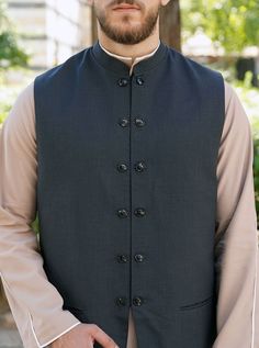 Open mandarin collar Full buttoned opening Faux line of buttons 2 front welt pockets Angled lower opening Model is 184cm (6 feet) and wearing size L Item Code: mW1201 Tailored Nehru Jacket For Semi-formal Events, Tailored Nehru Jacket With Stand Collar For Fall, Fitted Nehru Jacket With Button Closure For Winter, Classic Nehru Jacket With Stand Collar For Work, Classic Nehru Jacket With Stand Collar For Business, Semi-formal Outerwear With Stand Collar And Buttons, Semi-formal Outerwear With Hidden Button Stand Collar, Classic Nehru Jacket With Buttons For Workwear, Tailored Fall Nehru Jacket With Stand Collar