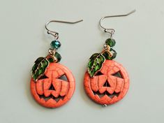 Stone earrings have been dyed orange and decorated with Czech glass beads and enamel leaves to create eye-catching Jack-O'-Lantern earrings.  HYPOALLERGENIC EAR WIRES: Gold-plated or silver-tone surgical steel or silver-tone titanium. MATERIALS USED are tarnish-resistant and durable. JEWELRY CARE QUESTIONS: Geologist here! I have a deeper understanding of most materials used in jewelry. Send ANY questions on materials or jewelry care that you have. CANCELLATIONS: Accepted within 24 hours of purc Hypoallergenic Earrings Sensitive Ears, Lantern Earrings, Earrings For Sensitive Ears, Earrings Hypoallergenic, Earrings Halloween, Witchy Jewelry, Halloween Earrings, Holiday Jewelry, Halloween Jewelry