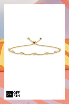 Bohemian In Essence, This Delicate Wheat Chain Bracelet Flaunts A Utilitarian Bolo Design. 14k Yellow Gold Bolo Clasp Imported Size Length, About 8.25"-8.75". Center Core - W Fine Jewelry > Saks Off 5th > Barneys Warehouse. Saks Fifth Avenue. Adjustable 14k Gold Bracelet With Gold Beads, Gold-tone Jewelry With Gold Beads, Gold Single Strand Beaded Bracelets, Gold Beaded Bracelets With Adjustable Length, Adjustable Gold-tone Jewelry With Round Beads, Adjustable Hand-strung Yellow Gold Necklace, Yellow Gold Bracelets With Adjustable Chain, Gold-tone Beaded Jewelry, Elegant Adjustable Gold Beaded Bracelet