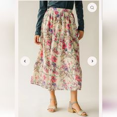 Beautiful Floral Print Skirt, Perfect For Spring Family Pictures Or Just A Day Out. New With Tags, Never Worn, No Flaws. Measurements: Waist Band Measures 14 In (Unstreached) Size Medium Color: Ivory Background With Pink And Purple Flowers. Modest Tiered Skirt, Modest Relaxed Tiered Skirt, Pink Flared Maxi Skirt With Floral Print, Flared Pink Maxi Skirt With Floral Print, Modest Tiered Skirt With Elastic Waistband, Flowy Full Pink Maxi Skirt, Flowy Full Maxi Skirt In Pink, Modest Tiered Skirt For Spring, Flowy Pink Floral Print Bottoms