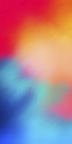 an abstract background with blue, red and yellow colors in the center is blurry