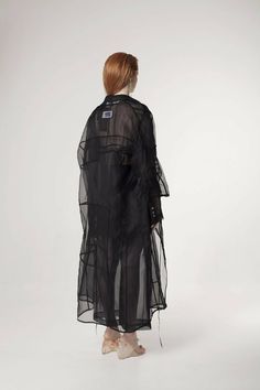 Deconstructed Transparent Silk Organza KimonoTailored transparent slightly oversized black silk organza kimono. Relaxed fit. Composition: 100% silk Care: Dry clean onlyMade in Latvia Sizes: S/M/L Models measurements: Height 173cm, Bust 82 cm, Waist 60 cm, Hips 88 cmModel wears size S Shipping: This garment is in stock and will be shipped within 5 - 8 working days from Latvia Black Sheer Long Sleeve Outerwear, Spring Black Sheer Outerwear, Organza Kimono, Transparent Kimono, Silk Organza, Latvia, Kimonos, Black Silk, Windbreaker Jacket