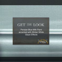 a sign that says get the look in front of a metallic background with black and white lettering