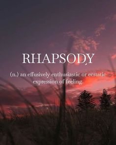 the words rhapsody are in front of a sunset and some trees