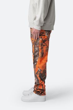 the V603 Camo Carpenter Pants are designed with our new V fit which is relaxed throughout, features a vintage wash and constructed from custom developed hunting camo fabric with a pink base. details relaxed fit throughout* 100% cotton extended inseam model is 6’1, 140 lbs and wears a size 30 *note: this denim is not constructed with stretch or spandex Camo Fabric, Layered Hoodie, Hunting Camo, 140 Lbs, Carpenter Pants, Denim Patchwork, New Years Sales, Denim Flares, Colored Denim