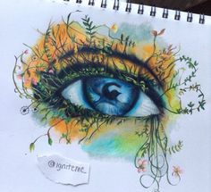 a drawing of an eye with flowers on it