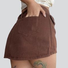 Brown ladies mini jean skirt online—cool women's denim skirt from the 2023 Summer collection. Street-style denim is the perfect blend of classic and modern fashion. This style is associated with timeless pieces not limited to any particular era yet representing a contemporary, stylish look. With street-style denim, you can express yourself freely and show off your unique style comfortably and functionally. You don't have to worry about conforming to trends or feeling pressured to wear something Mini Jean Skirt, Brown Mini Skirt, Womens Denim Skirts, Ankle Sandals, Denim Patterns, Skirts Online, Jean Skirt, Premium Denim, Contemporary Fashion