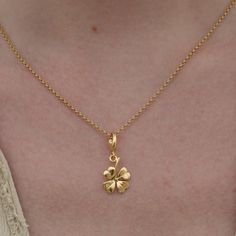 This gorgeous Gold Plated Four Leaf Clover Necklace is an iconic symbol of luck and prosperity! It's a beautiful accessory that you'll feel blessed to have each day you wear it. It's a special piece that is perfect for wear or gifting - absolutely not your typical charm necklace!  All our charms attach with a clip-on clasp and are compatible with all other leading charm jewellery brands. Simply clip-on or slide-on to a chain, charm bracelet or charm carrier necklace.  All Lily Charmed jewellery Dainty Flower Pendant Charm Necklace For Good Luck, Dainty Good Luck Flower Pendant Charm Necklace, Yellow Gold Necklaces For Good Luck, Gold Flower Pendant Necklace For Good Luck, Yellow Gold Good Luck Necklace, Dainty Flower Pendant Jewelry For Good Luck, Dainty Good Luck Jewelry With Flower Pendant, Elegant Good Luck Jewelry With Flower Charm, 4 Leaf Clover Necklace