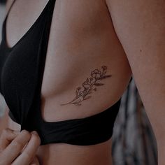 a woman with a tattoo on her chest