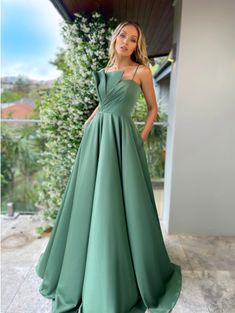 Jadore Jx5010 has spaghetti straps an asymmetrical neckline with a long aline silhouette Green Satin Bridesmaid Dresses, Frock Ideas, Mothers Gowns, Accessories Beach, Prom Dresses Elegant, Brimmed Hat, Prom Dress Styles, Elegant Girl, Princess Dresses