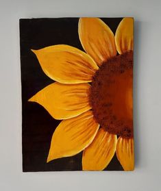 a painting of a yellow sunflower on a black background