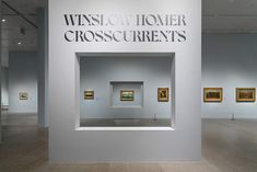 an art gallery with white walls and paintings on the wall that says wisconsin homer crosscurrents