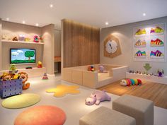 a child's playroom with toys and stuffed animals on the floor in front of a flat screen tv