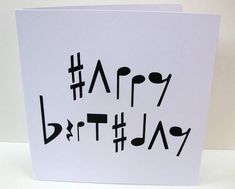 a birthday card with the words happy birthday written in black ink on white cardstock