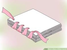 a stack of books with pink ribbon tied around them