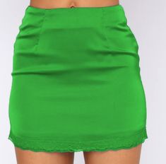 The Emes Shopmini skirt is detailed with a fitted waist. and form fitting throughout. Features a zipper closure. and lace trim detail on bottom hem. This cute and classic skirt pairs easily with anything. making it a closet staple piece.MATERIAL:80% Soft Poly 20%Spandex MEASUREMENTS:﻿Small : 4-6 Waist: 25 26.5 n Hips: 35 36.5 n Length: 16.1" in Medium : 6-8 Waist: 26.5 28 n Hips: 36.5 38 n Length: 16.5" in Large : 8-10 Waist: 28 29.5 n Hips: 38 39.5 n Length: 17.1" in X-Large : 10-12 Waist: 29.5 31 n Hips: 39.5 41 n Length: 17.7" in Classic Skirts, Slip Skirt, Lace Hem, Closet Staples, Green Skirt, Trim Detail, Staple Pieces, Lace Trim, Mini Skirts