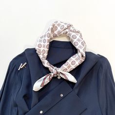 Elevate your look with this men's silk neckerchief featuring a distinguished medal pattern. Made from 100% silk, this neckerchief offers a soft, lightweight feel that drapes effortlessly for a polished yet relaxed style. The medal design adds a subtle statement, perfect for enhancing casual or semi-formal outfits. Whether worn around the neck, or as a chic jacket square, this versatile accessory adds a touch of timeless elegance to any modern man looking to elevate his wardrobe. Benefits of Wear Mens Neckerchief, Medal Design, Silk Hair Scarf, Bandana Men, Small Silk Scarf, Chic Jacket, Silk Scarf Hair, Silk Neck Scarf, Silk Headscarf