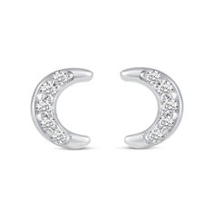 She'll love the celestial theme of this charming diamond three-pair stud earrings set. Crafted in sterling silver, this set features dainty diamond-touched earrings - one pair each of curved lightning bolts, crescent moons and four-pointed stars. Captivating with 1/10 ct. t.w. of diamonds and a bright polished shine, these earrings secure with push-screw backs. Fine Diamond Moon Shaped Jewelry, Celestial Cubic Zirconia Jewelry In Diamond White, Fine Jewelry Moon Shaped With Diamond Accents, Fine Jewelry Moon-shaped With Diamond Accents, Moon Shaped Fine Jewelry With Diamond Accents, Moon-shaped Fine Jewelry With Diamond Accents, Luxury Silver Crescent Jewelry, Elegant Crescent Diamond Earrings, Moon Shaped Single Cut Diamond Jewelry